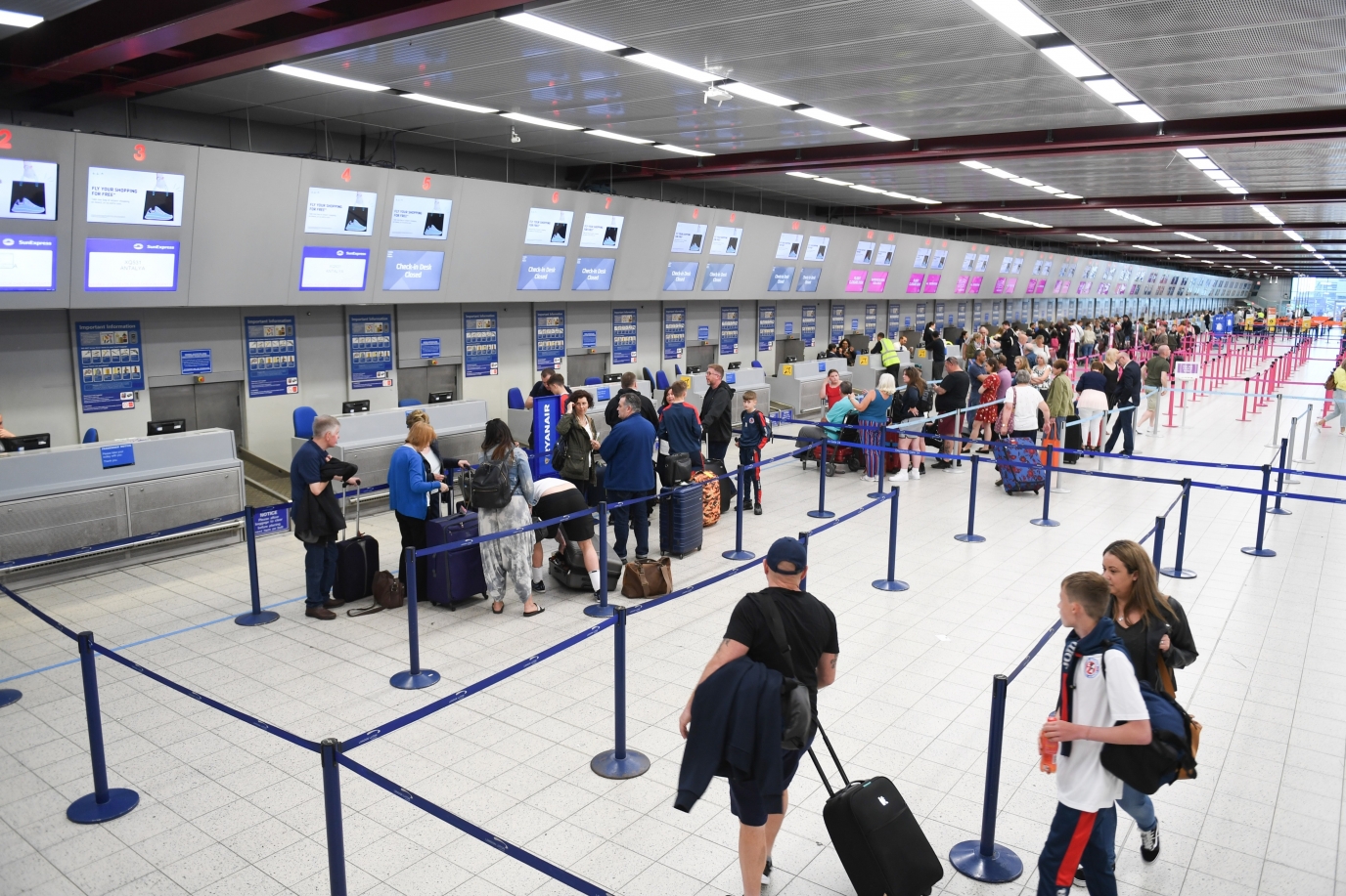 Photo d'illustration montrant des passagers attendant à l'aéroport